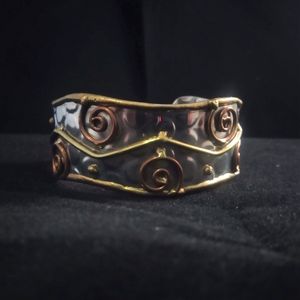 Hammered Sold Cuff Bracelet With Spiral Design